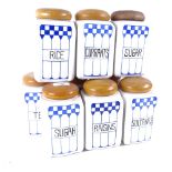 A set of 9 German Art Deco ceramic kitchen storage jars, 7 marked Felix, with turned wood lids,