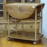 An Ercol elm 3-tier drop leaf tea trolley, W74cm, H75cm