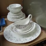 A Wedgwood April Flowers bone china dinner service, including meat plate, sauce boat, dinner