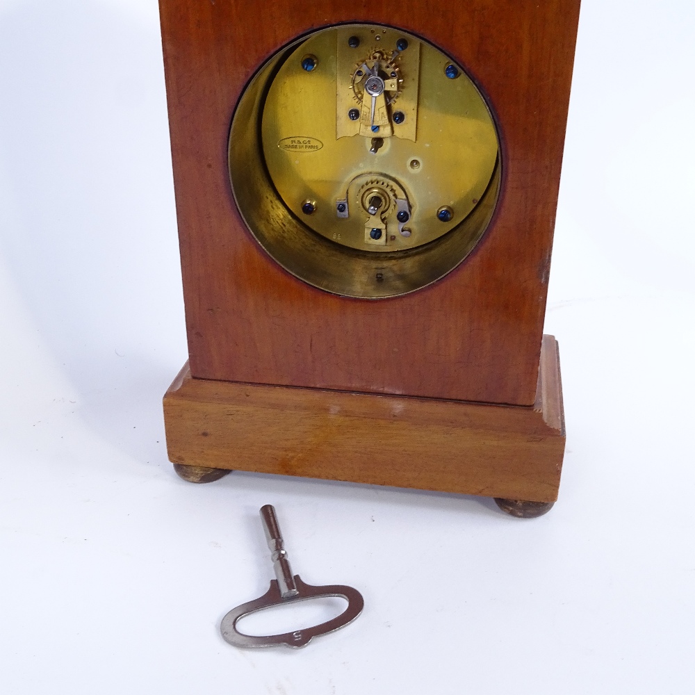 An early 20th century walnut dome-top mantel clock, examined by Mappin & Webb Ltd of London, - Image 2 of 2