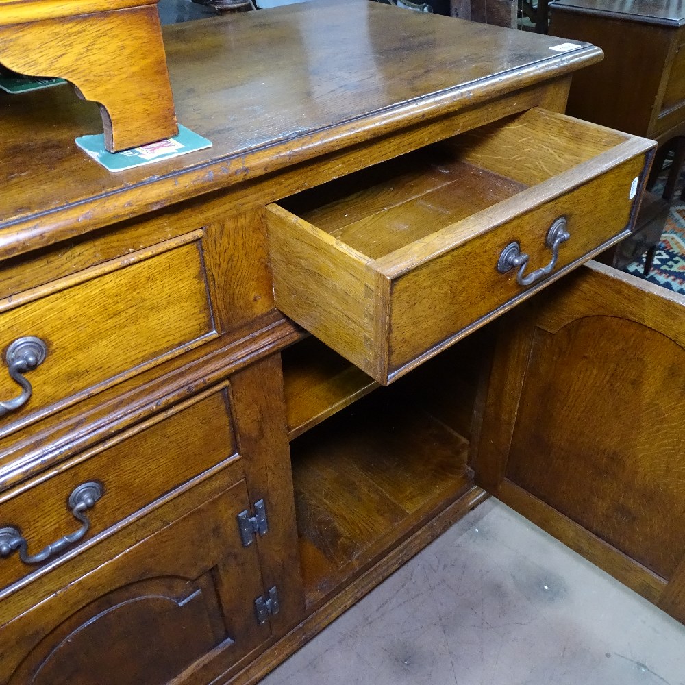 An Ipswich oak design sideboard, with 3 frieze drawers, and fielded cupboards under, on stile - Image 2 of 2