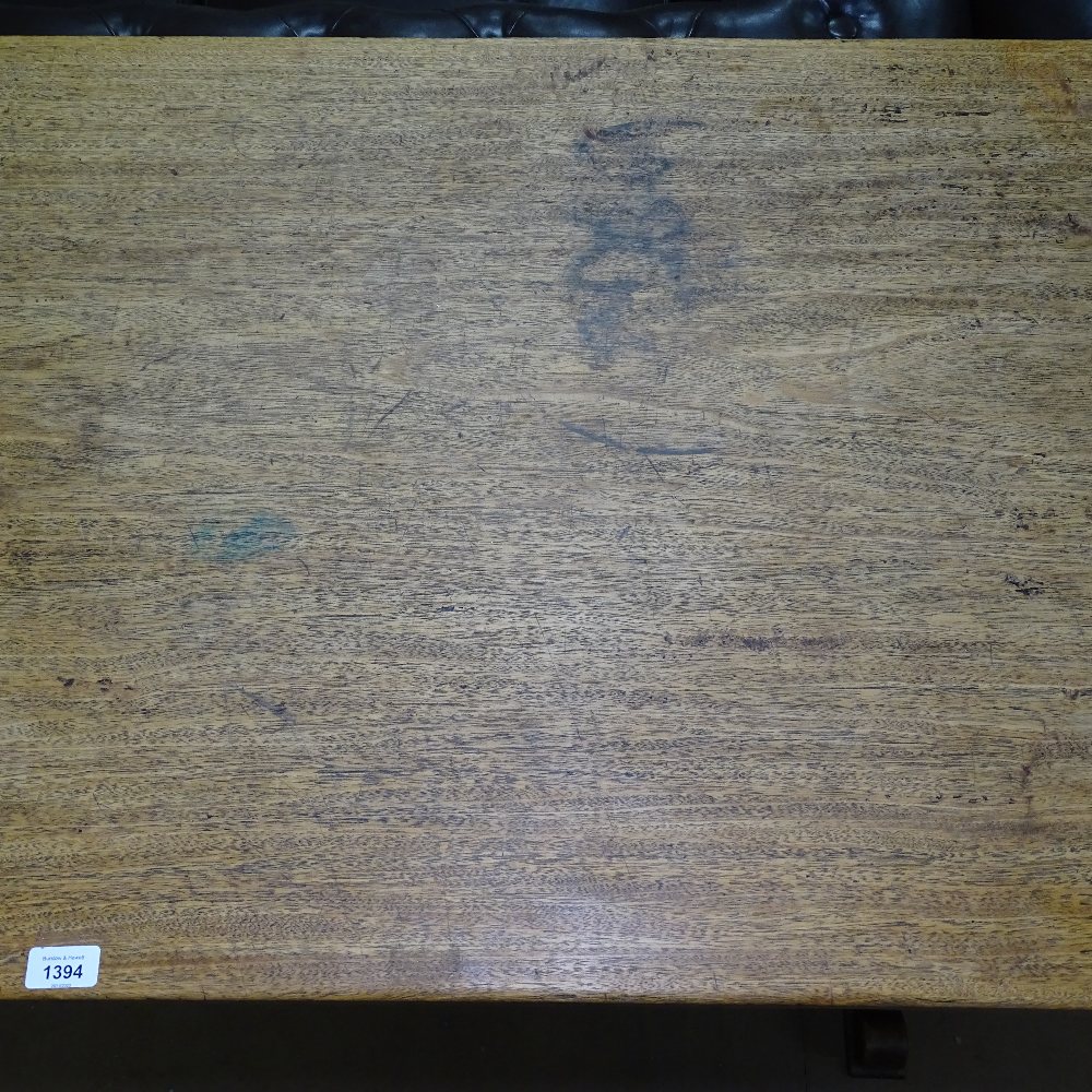 A 1930s oak rectangular refectory dining table, on pegged tablet ends, L153cm, H76cm - Image 2 of 2