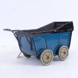 An early 20th century Huntley & Palmers pram biscuit tin, circa 1930, lithographed tin panels with