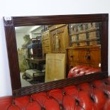 A Regency mahogany wall mirror, 77cm x 52cm and another