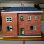 A small Vintage doll's house, W63cm