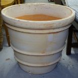 An unglazed terracotta Cretan design garden pot, W51cm