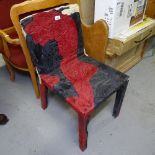 A Casamania & Horm Stone Roses Remember Me Chair, custom-made from Stone Roses T-shirts and jeans,
