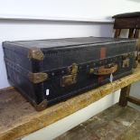 A Vintage steel-bound travelling steamer trunk, with fitted interior
