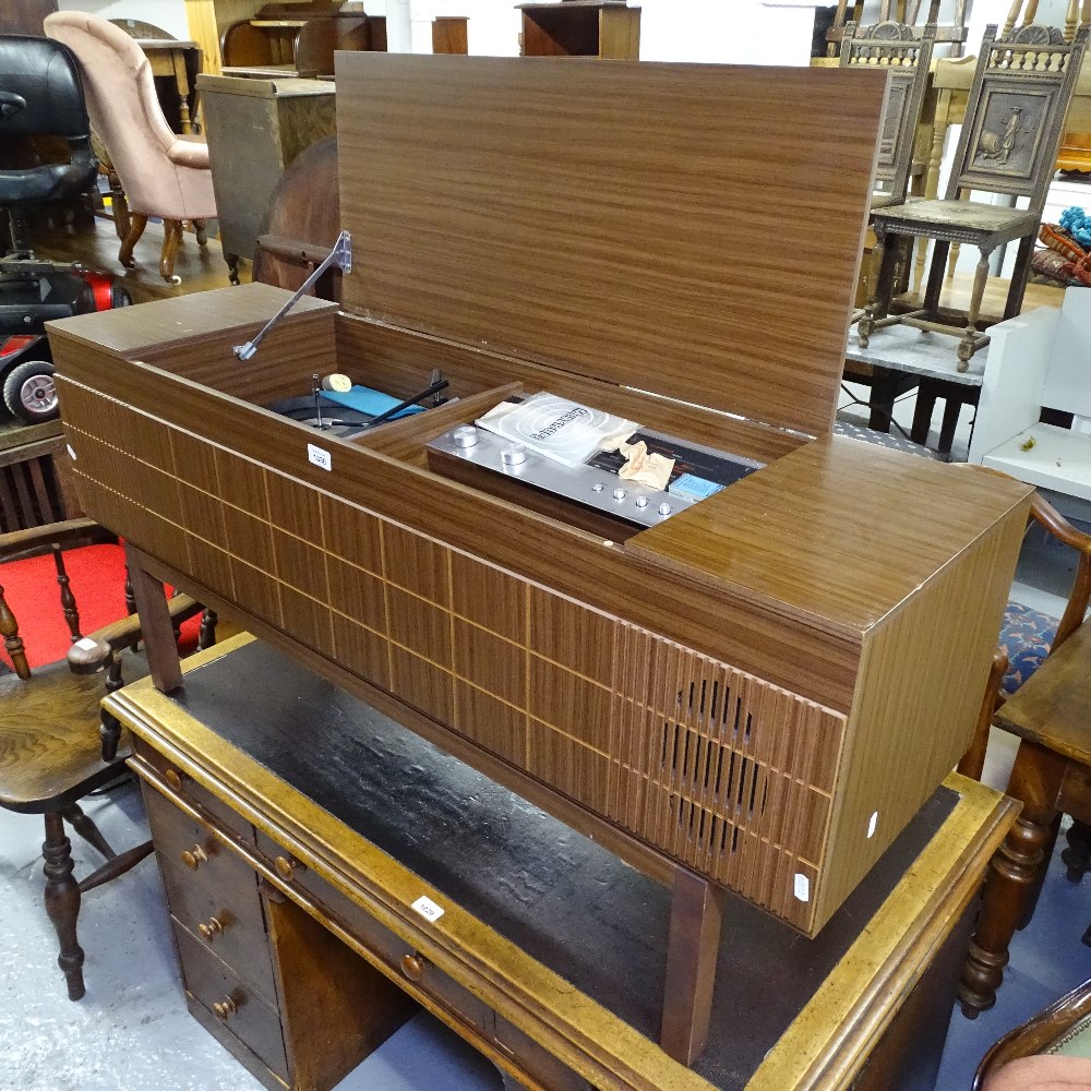 A mid-century HMV radiogram, with turntable, L126cm