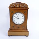 An early 20th century walnut dome-top mantel clock, examined by Mappin & Webb Ltd of London,