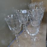 A set of 5 red wine goblets, 22cm, and 5 matching Champagne flutes
