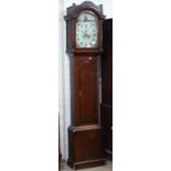 An 18th century 8-day clock, with arch-top painted dial and 2 subsidiary dials, in a cross-banded