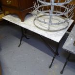 A rectangular white and grey speckled marble-top garden table, on cast-iron base, W100cm