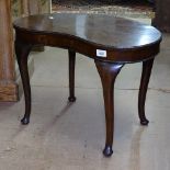 An Edwardian mahogany kidney-shape lamp table, W60cm, H42cm