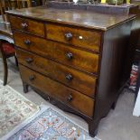 A 19th century mahogany and satinwood-strung chest of 2 short and 3 long drawers, on bracket feet,