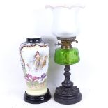 A Victorian oil lamp with green glass font, 59cm, and a painted Edwardian glass vase on stand