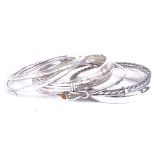 7 various engraved and plain silver bangles