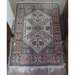A cream ground Persian design rug, 150cm x 100cm