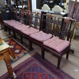 A set of 6 Chinese hardwood dining chairs, with dragon carved panelled backs