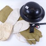 A Second War Period British Army Brodie steel helmet, Arctic climate mittens, a Gat air pistol by