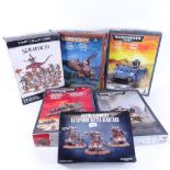 Various Games Workshop plastic assembly model toys, including Warhammer 40,000, and a Schuco