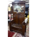 An Edwardian oak and mirror-back hall stand, W112cm, H215cm