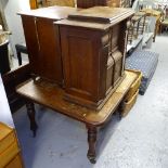 A Vintage oak-cased Singer treadle sewing machine, a Victorian mahogany dining table, and a 19th