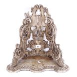 An Antique carved wood wall bracket, figural supports with fleur de lis emblem, overall height 42cm