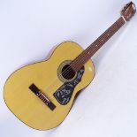 A modern acoustic guitar with nylon strings, length 100cm
