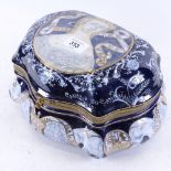 A Continental porcelain box of shaped form, with painted and gilded decoration, width 28cm