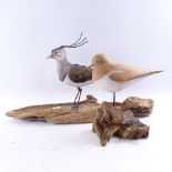 A carved and painted wood sandpiper sculpture, by Geoffrey Bickley, and a ceramic and metal