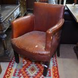 An early 20th century leather-upholstered Club chair