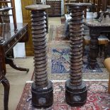 A pair of Antique Continental elm spiral columns, H103cm