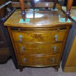 A 1930s walnut bow-front bachelor's chest with brushing slide, 3 drawers under, cabriole legs,