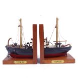 A pair of handmade bookends in the form of a fishing boat, combined length 30cm, height 20cm