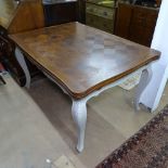 A French oak parquetry-topped draw leaf dining table, on painted base, W140cm