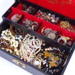 A cantilever jewel box with a quantity of costume jewellery, rosaries etc