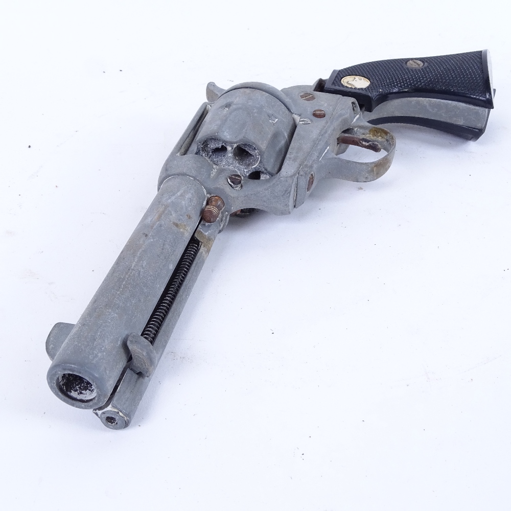 A replica Colt revolver, 4" cylindrical barrel with steel frame and plastic grips