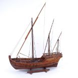 A handmade model sailing ship of a 3-masted Caravel, on stand, length 48cm, height 70cm