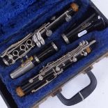 A Vintage black lacquered Boosey & Hawkes 4-section clarinet, overall length 68cm, in fitted