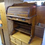 A 1920s oak roll-top student's bureau, W72cm