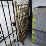A Victorian brass single bed