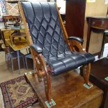 An Anglo-Indian campaign chair with leather sling seat, in the manner of Herbert McNair