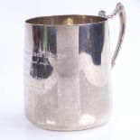 A George V silver mug, tapered cylindrical form with scrolled acanthus leaf handle, by Fenton