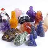 A collection of Chinese snuff bottles, including a relief carved natural amethyst bottle, height