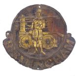 A 19th century embossed brass Birmingham fire mark, depicting a fireman and engine, height 26cm