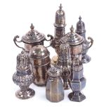 A group of various silver pepperettes, including urn models, 6.8oz total (9) Generally good