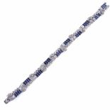 An Art Deco sapphire and diamond bracelet, circa 1930s, geometric and scroll form, set with