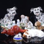 A group of mainly 19th century porcelain animals, including a pair of Terriers, height 7cm