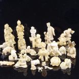 A collection of 19th century Japanese ivory carvings, netsuke and okimono